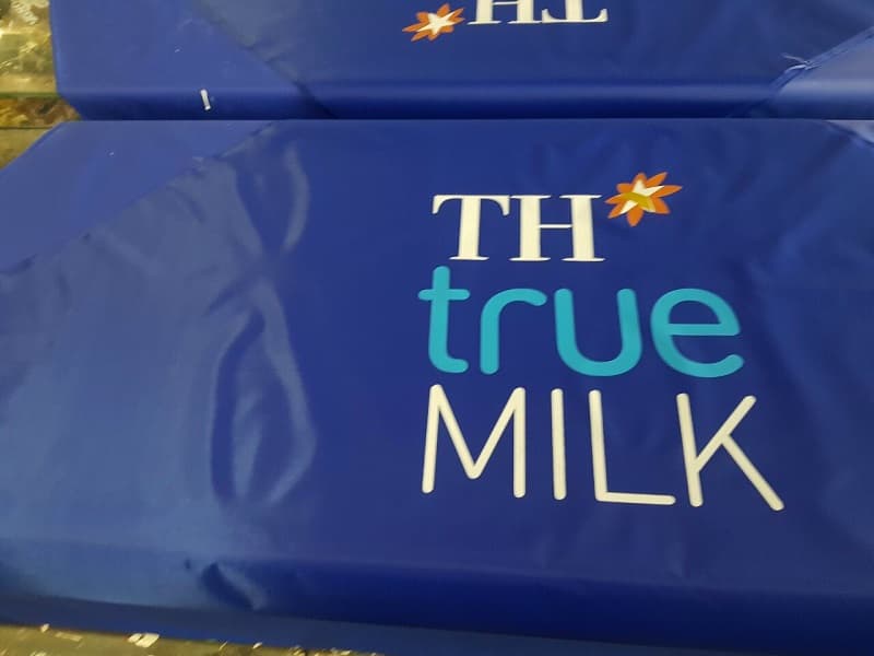 Áo mưa in logo TH True Milk