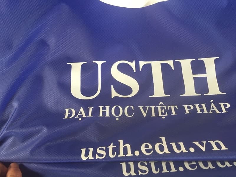 Áo mưa in logo khách hàng USTH